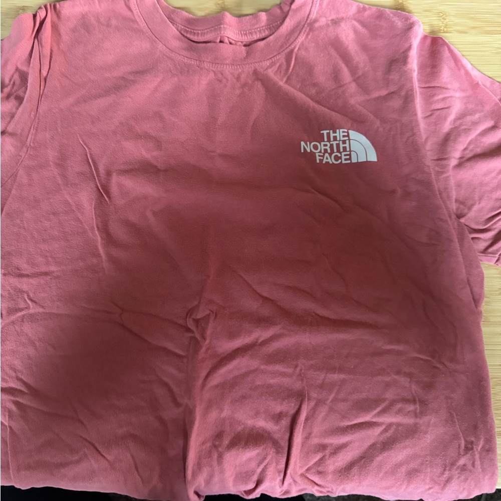 Pink women’s north face t shirt